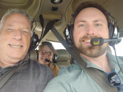 A selfie of me piloting a plane (not the same one we had) with my parents