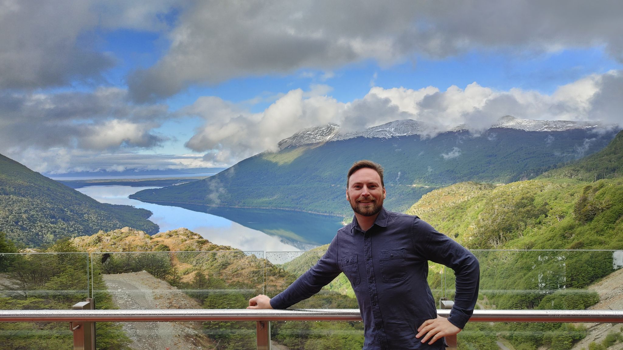 Photo of me in Usuaia, Argentina overlooking a valley with a lake