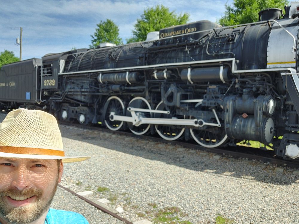 Me in front of the Chesapeake Ohio train, an old steam locomotive