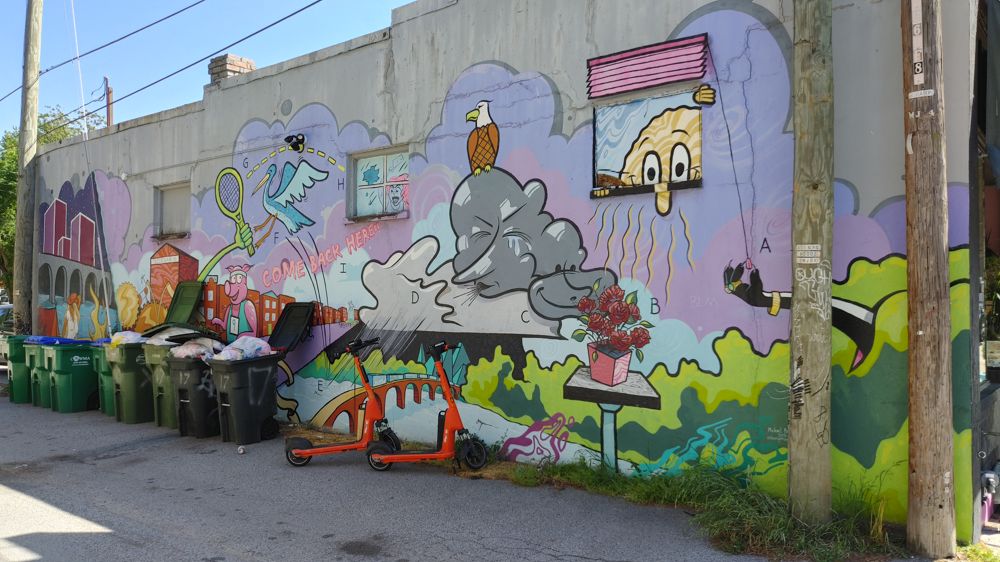 more stream art in an alley featuring cartoon style characters